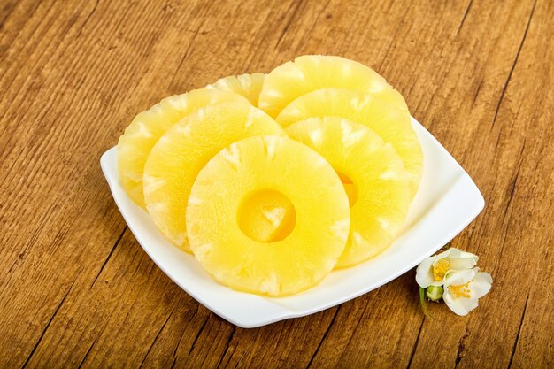 Canned pineapple rings in the bowl