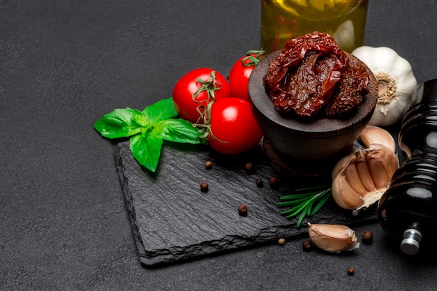 Canned Sundried or dried tomato halves in wooden bowl