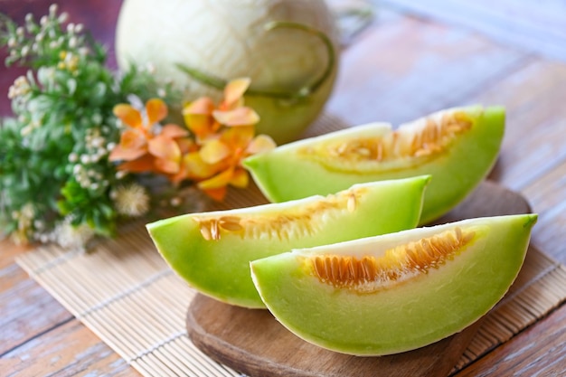 Cantaloupe melon on plate wooden cantaloupe thai slice fruit for health green cantaloupe thailand