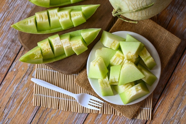 Cantaloupe melon on plate wooden cantaloupe thai slice fruit for health green cantaloupe thailand