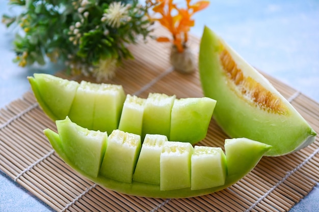 Cantaloupe thai slice fruit for health green cantaloupe thailand cantaloupe melon on plate wooden