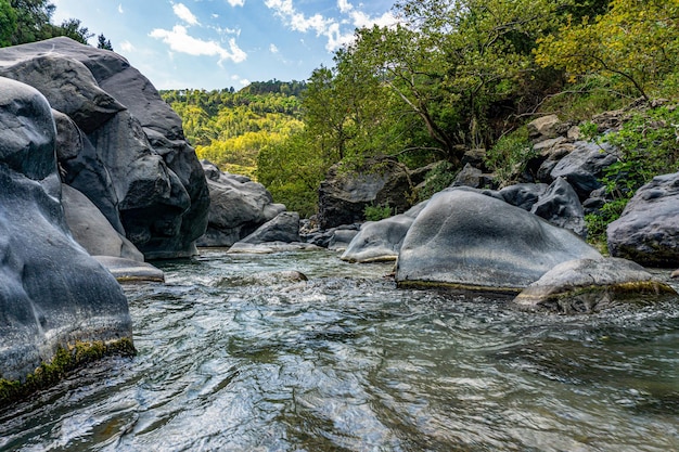 A canyon river Alcantara, which goes through the lava stones of Mount Etna in Sicily, Italy