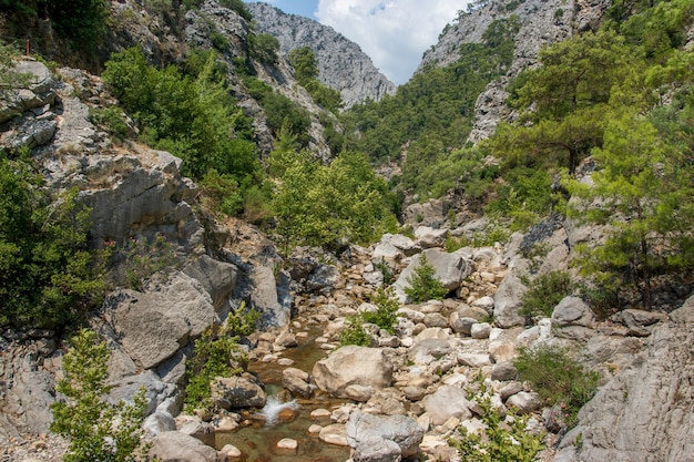 A canyon with a hiking trail Mountain river Part of the Lycian trail through the mountain range