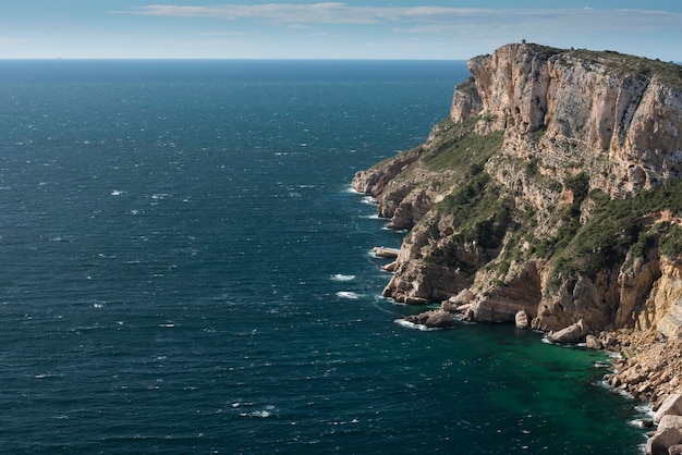 Cap d'Or tower and cliffs, Moraira,Costa Blanca, Alicante, Spain