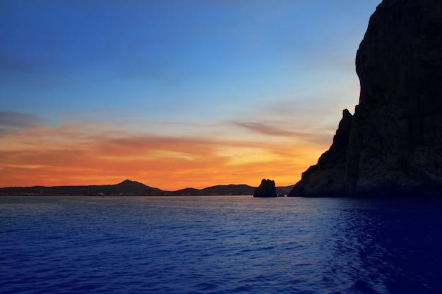 Cape San Antonio Javea Xabia sunset from sea