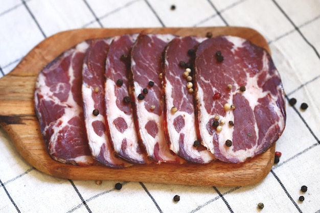 Capocollo Italian ham slices on the board