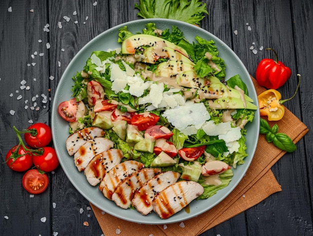 Caprese lunch bowl with grilled chicken and avocado