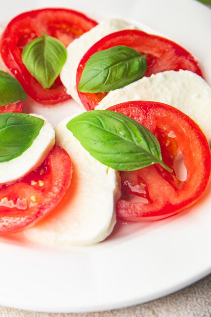 caprese salad mozzarella and basil tomato fresh meal food snack on the table copy space food