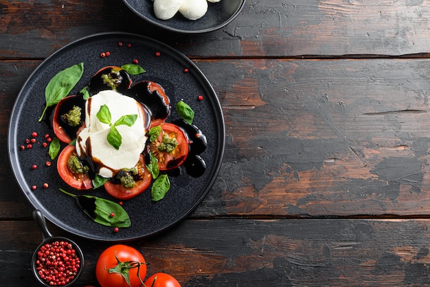 Caprese salad with cherry tomatoes and pepper