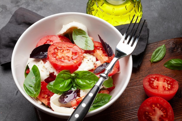 Caprese salad with fresh tomatoes basil and mozzarella cheese