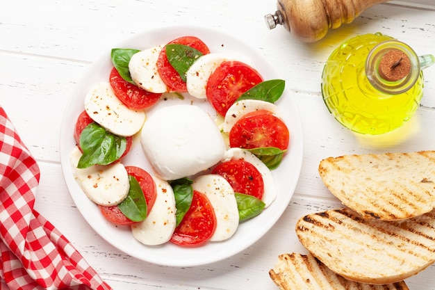 Caprese salad with mozzarella basil and garden tomatoes