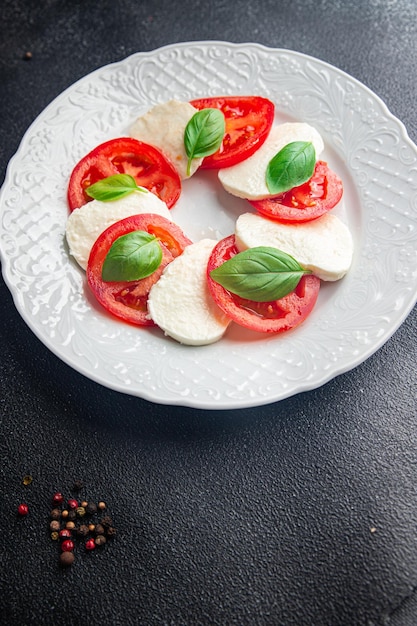 caprese saladmozzarella basil tomato fresh dish healthy meal food snack on the table copy space