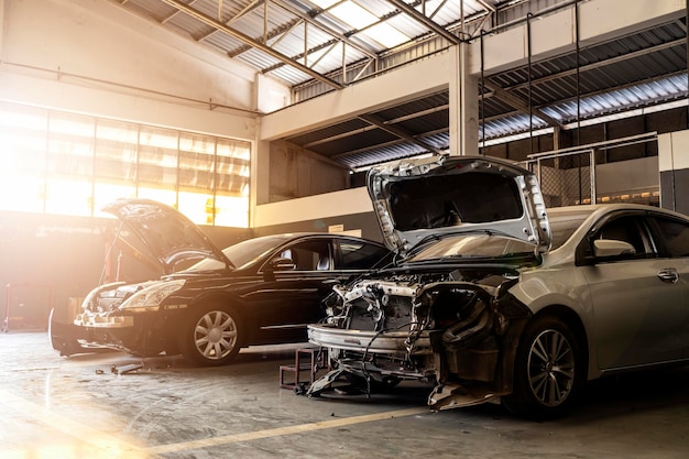 Car in automobile repair service center with softfocus and over light in the background