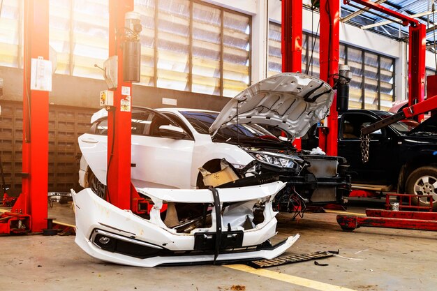 Car in automobile repair service center