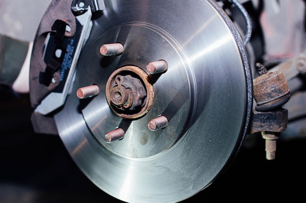 car brake repair installation of a new brake disc