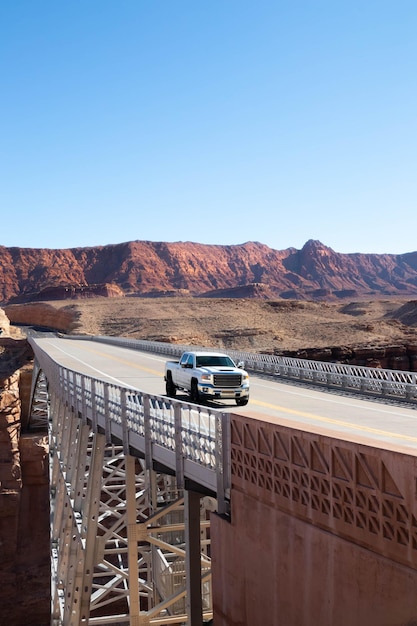 Car crossing the Navajo Bridge Across the Colorado River