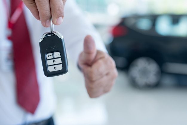 Car dealer with a key