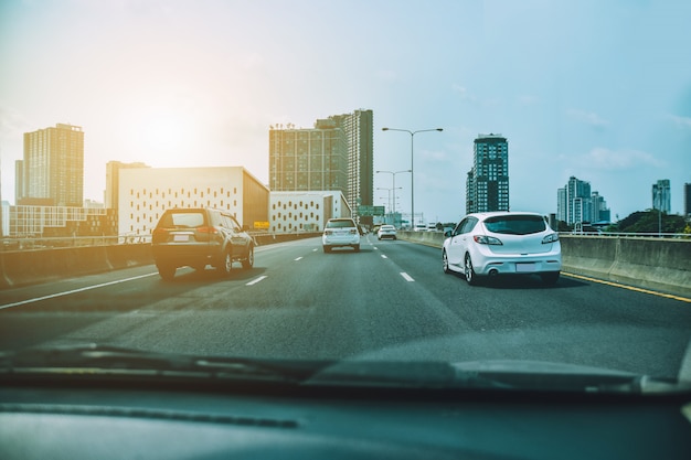 Car driving on highway  road,Car parked on road and Small passenger car seat on the road used for daily trips