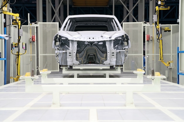 Car frame with unfinished assembly in the production line of the automobile enterprise