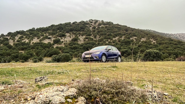 Car in the middle of the field Pollution of car are danger to environment