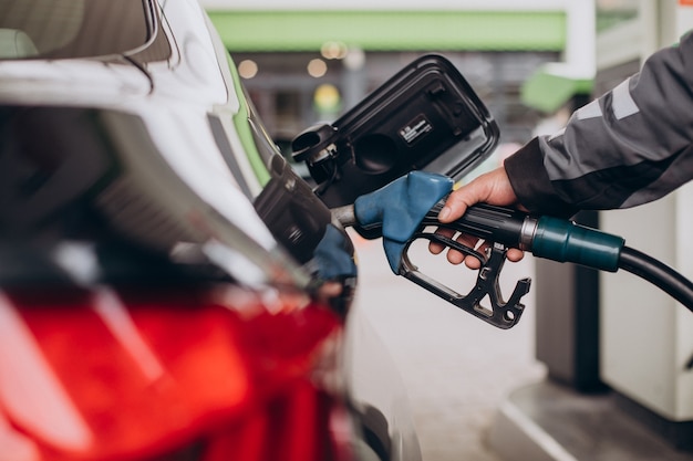 Car refueling at fuel station