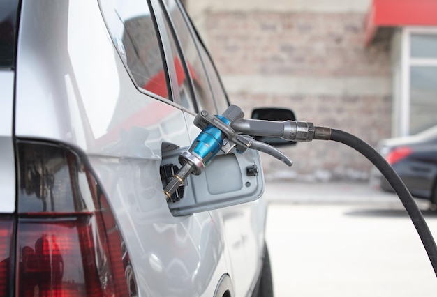 Car refuelling at the gas station