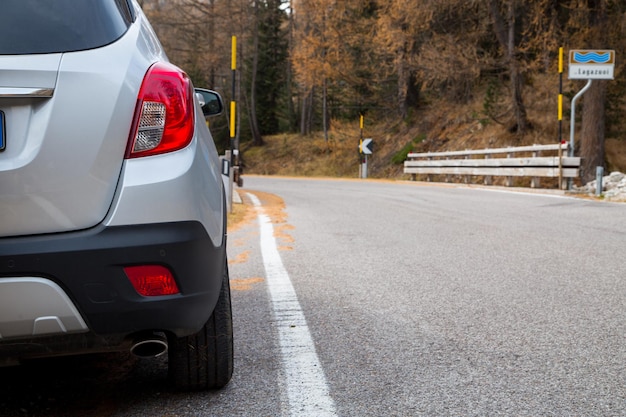 Car rental parking on the asphalt road ,Tuscany Italy.