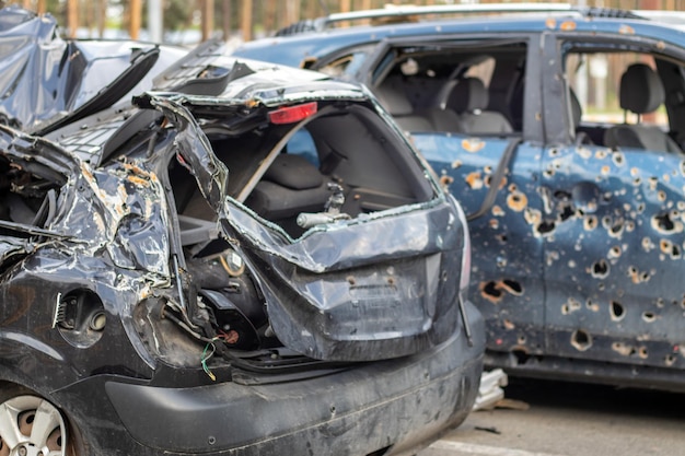 Car riddled with bullets War of Russia against Ukraine A car of civilians shot by the Russian military during the evacuation of women and children Traces of bullets and fragments of shells