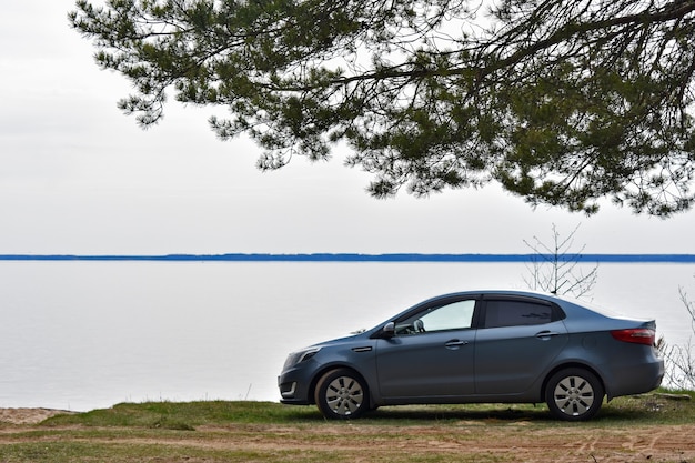 Photo car on the river bank