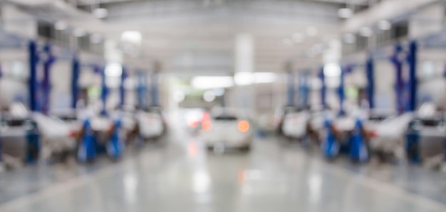 Car service centre auto repair workshop blurred panoramic background