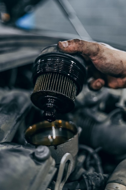 Car service station , oil and filter replacement, car maintenance.