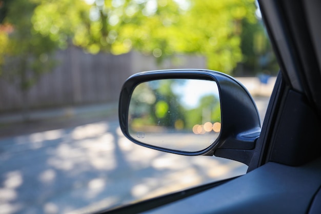 Car side mirror represents reflection awareness safety and the visual extension of the driver's f