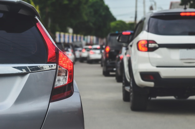 Car tail lights, traffic jams during rush hour.