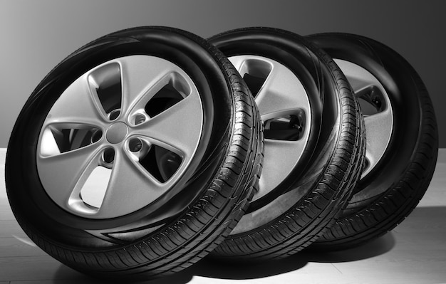 Car tires with rims indoors