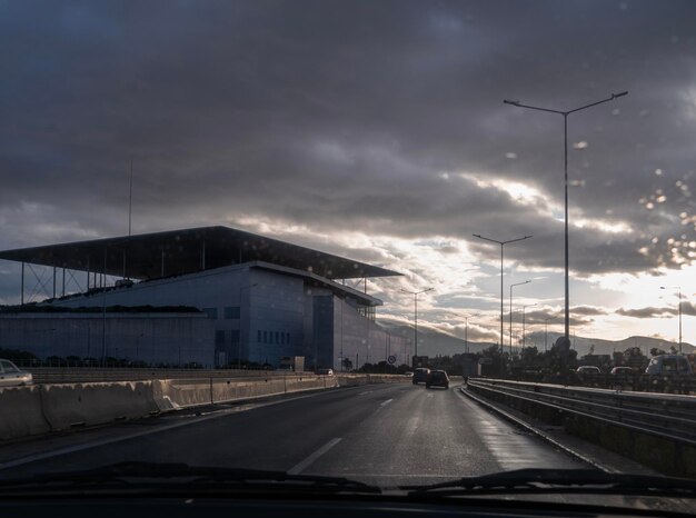 Car traffic along the highway past the Niarchos Cultural Center in Athens Greece