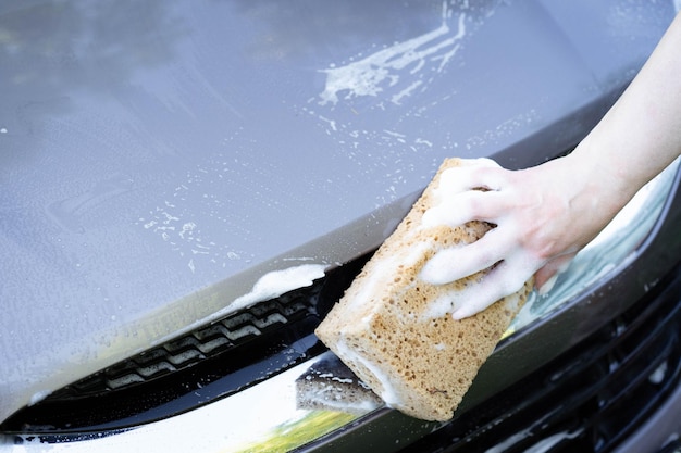 Car wash car care summer car wash Cleaning the car using water