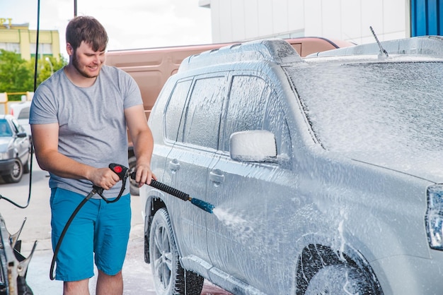 Car wash concept vehicle in soap cleaning