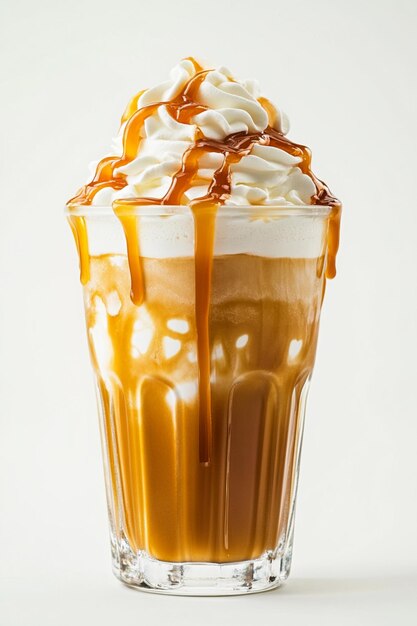 Photo caramel frappuccino in a clear glass with whipped cream and caramel sauce