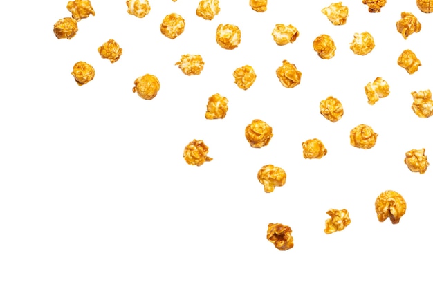 Caramel pop corn isolated on white background. Copy space.