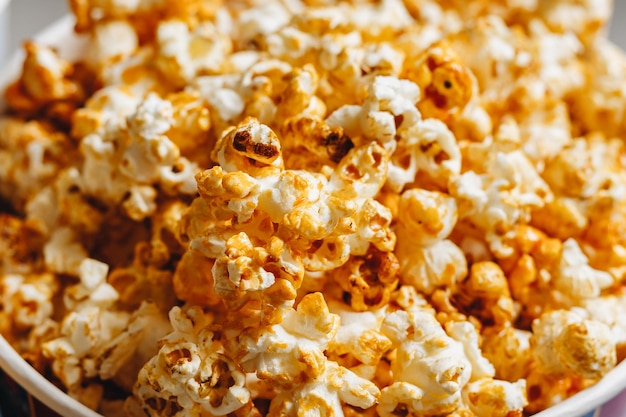 Caramel popcorn texture closeup background