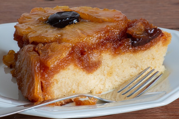 Caramelized pineapple cake with plums