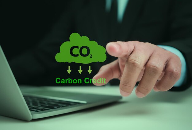 Photo carbon credit market concept businessman uses technology to exchange carbon credits