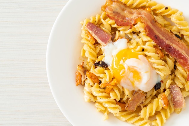 carbonara fusilli pasta spicy bacon - Italian food style