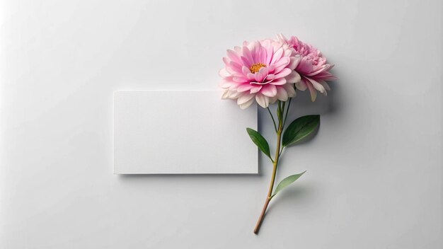 Photo a card with a pink flower and a card that says quot a card quot