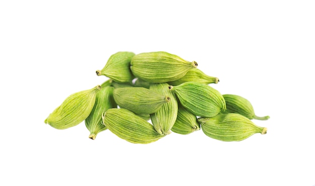 Cardamom pods isolated on white. Green cardamon seeds. Clipping path.