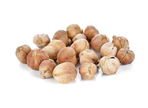 Cardamom seeds isolated on over white background