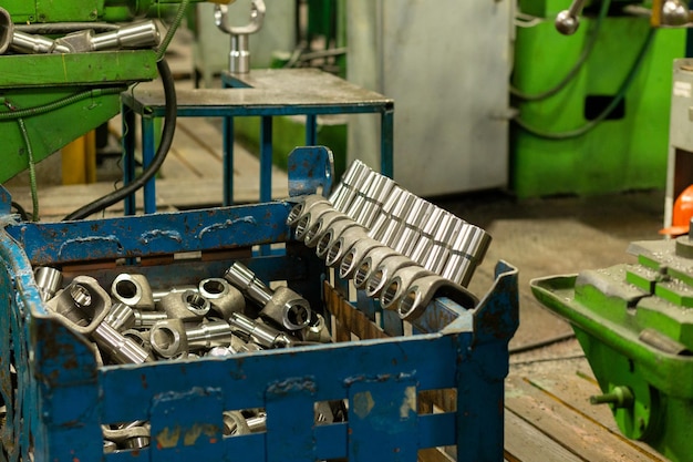 Cardan shafts and gimbal transmissions laying in box during production process