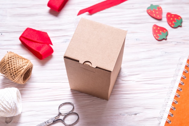 Cardboard box on wooden table