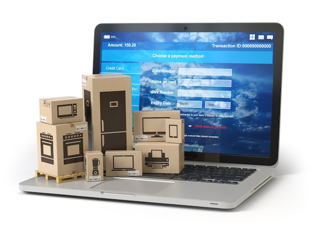 Cardboard boxes with appliaces on PC laptop keyboard Ecommerce online shopping and delivery