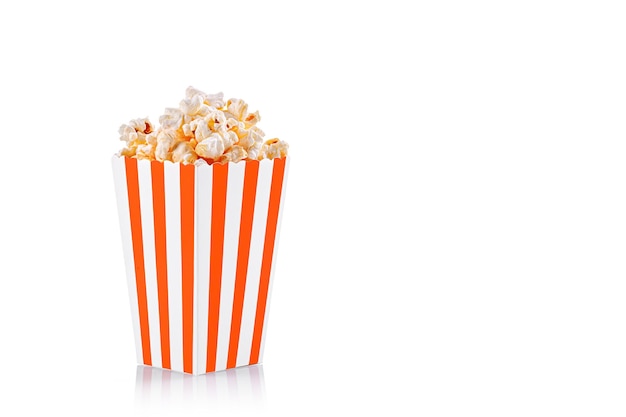 Cardboard glass orange brown with popcorn on a white transparent background closeup